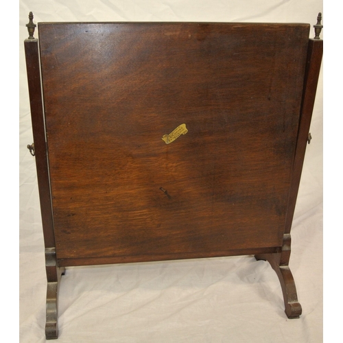 298 - Edwardian mahogany swivel mirror with reeded columns and stretcher, on bracket feet