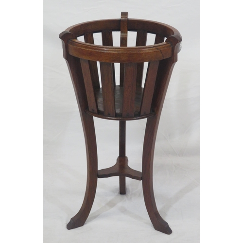 299 - Edwardian style oak jardiniere stand with shaped legs and stretcher