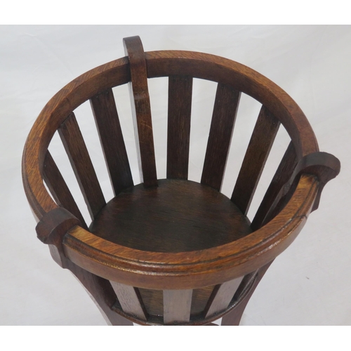 299 - Edwardian style oak jardiniere stand with shaped legs and stretcher