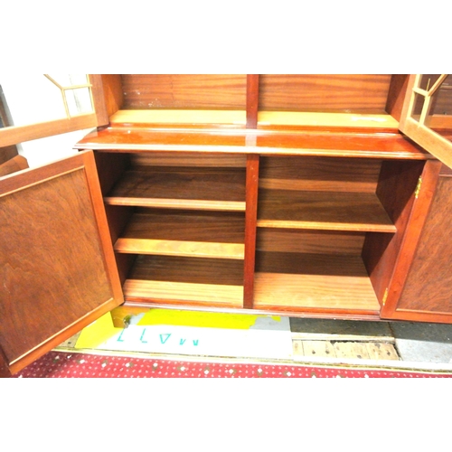 305 - Edwardian design inlaid mahogany triple bookcase with astragal glazed doors, shelved interior, shelv... 