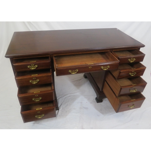 310 - Edwardian mahogany kneehole desk with 9 drawers, brass drop handles with pierced backplates, on brac... 