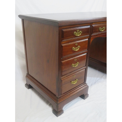 310 - Edwardian mahogany kneehole desk with 9 drawers, brass drop handles with pierced backplates, on brac... 