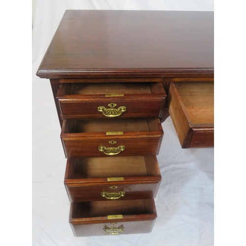 310 - Edwardian mahogany kneehole desk with 9 drawers, brass drop handles with pierced backplates, on brac... 