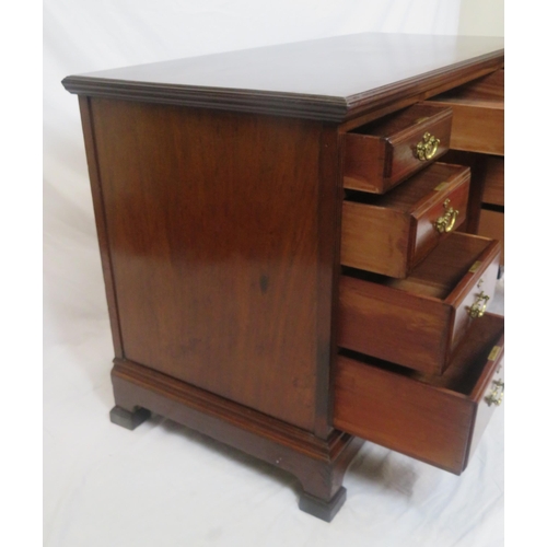 310 - Edwardian mahogany kneehole desk with 9 drawers, brass drop handles with pierced backplates, on brac... 