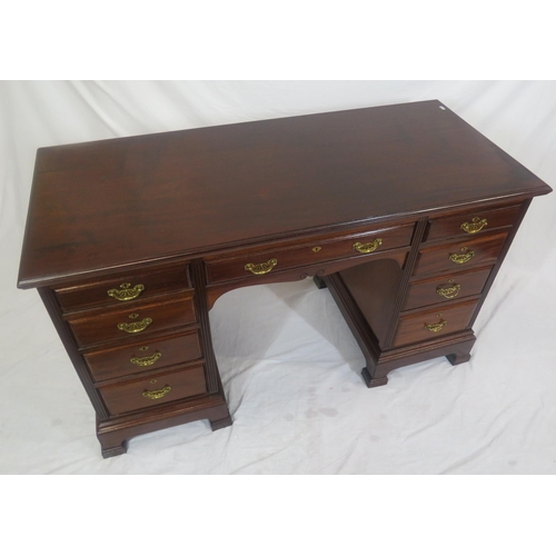 310 - Edwardian mahogany kneehole desk with 9 drawers, brass drop handles with pierced backplates, on brac... 