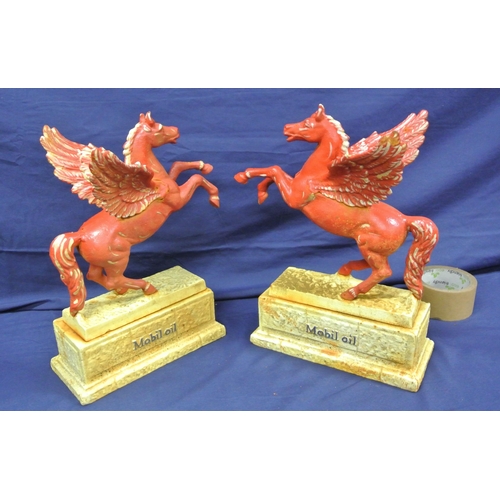 312 - Pair of cast iron 'Mobil Oil' Pegasus horse advertising figures on oblong bases