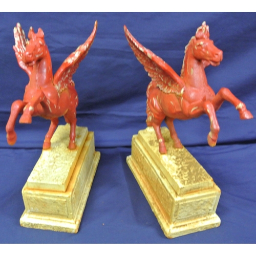 312 - Pair of cast iron 'Mobil Oil' Pegasus horse advertising figures on oblong bases