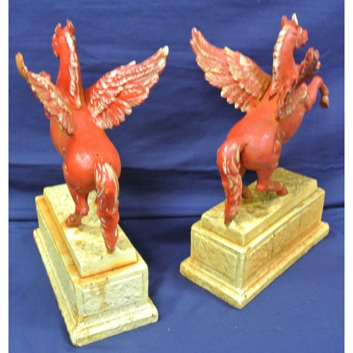 312 - Pair of cast iron 'Mobil Oil' Pegasus horse advertising figures on oblong bases