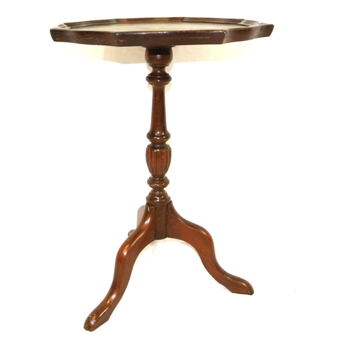 314 - Edwardian mahogany occasional or lamp table with wavy rim, turned column, on tripod