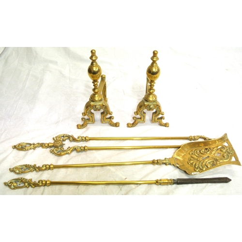 327 - Set of 3 Victorian style brass fire implements with ornate pierced handles and a pair of brass rests