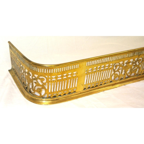 338 - Edwardian brass fender with pierced decoration