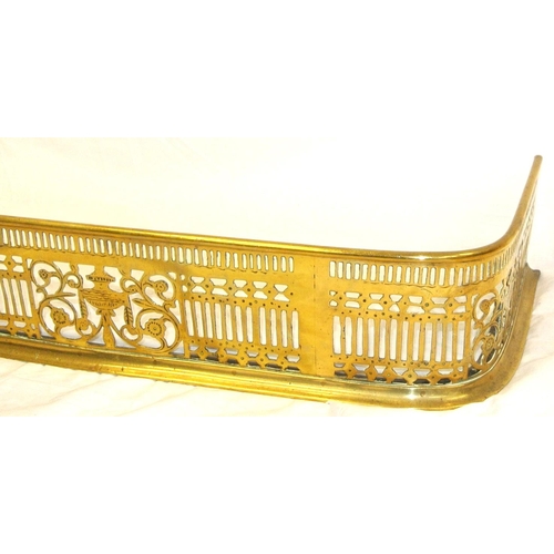 338 - Edwardian brass fender with pierced decoration