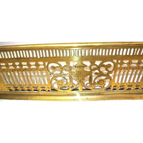 338 - Edwardian brass fender with pierced decoration