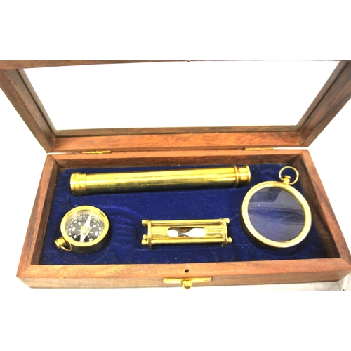 343 - Mariners brass presentation set in glass topped presentation  case