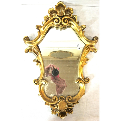 349 - Small gilt framed Regency design shaped wall mirror with shell and scroll decoration