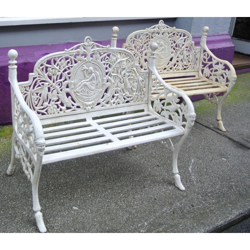 369 - Pair of Victorian design cast iron garden benches with figured plaques inset, foliate decoration, me... 