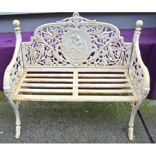 369 - Pair of Victorian design cast iron garden benches with figured plaques inset, foliate decoration, me... 