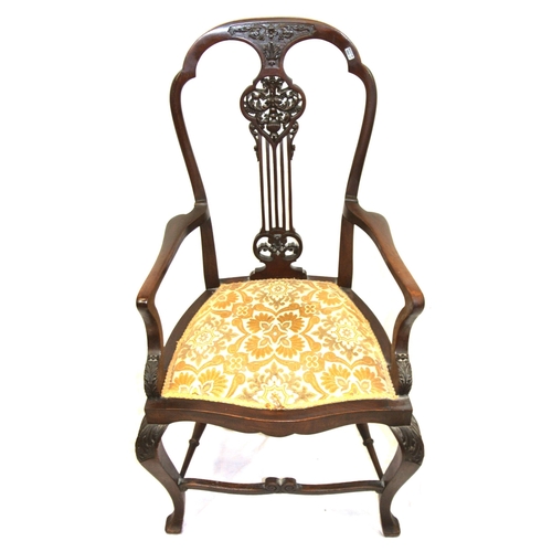 373 - Victorian mahogany open armchair with foliate carved pierces splat, shaped arms and seat, on cabriol... 