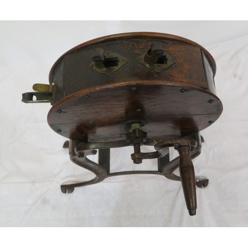 201 - Edwardian timber & cast iron knife sharpener with round top, shaped handles, on cast iron base