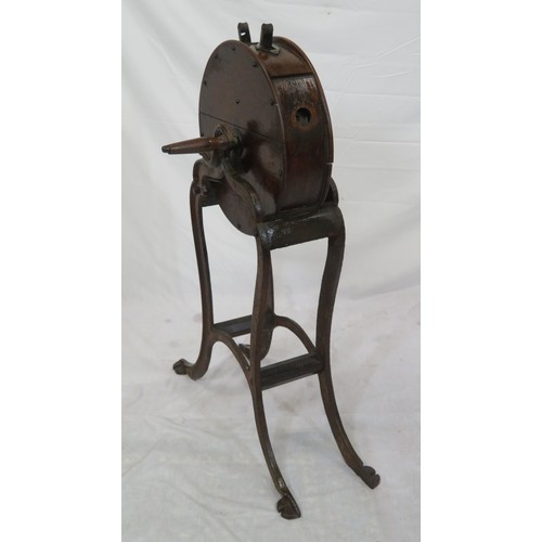 201 - Edwardian timber & cast iron knife sharpener with round top, shaped handles, on cast iron base