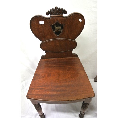 372 - Pair of Victorian mahogany hall chairs with shaped backs, inset crests, bowfront seats, on turned ta... 