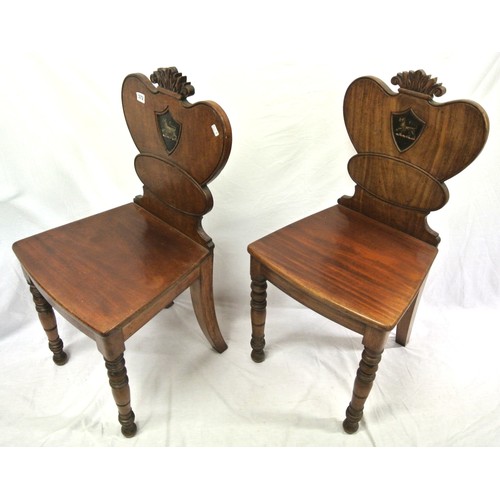 372 - Pair of Victorian mahogany hall chairs with shaped backs, inset crests, bowfront seats, on turned ta... 