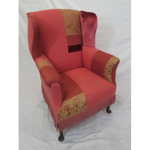 388 - Georgian style wingback armchair with cabriole legs and pad feet