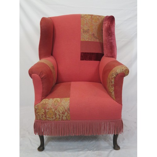 388 - Georgian style wingback armchair with cabriole legs and pad feet