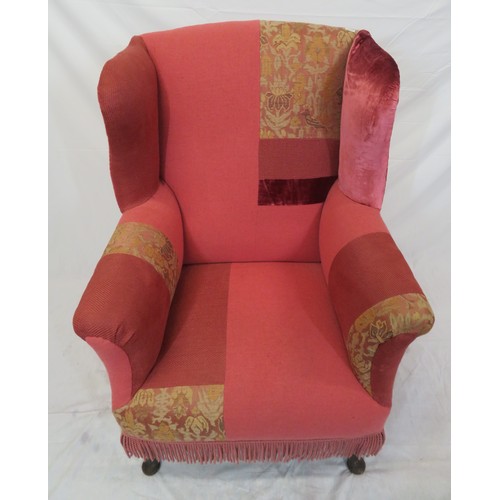 388 - Georgian style wingback armchair with cabriole legs and pad feet