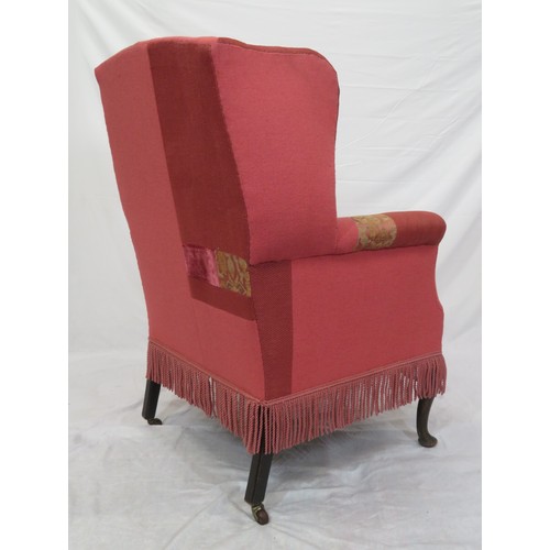 388 - Georgian style wingback armchair with cabriole legs and pad feet