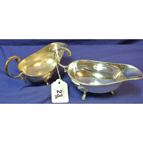 19 - Pair of boat shaped silverplated sauce or gravy boats with Celtic rims, S-shaped handles, and hoof f... 