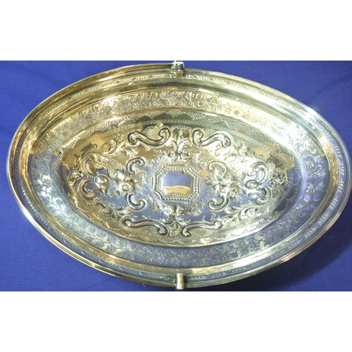 100 - London George III silver oval basket with reeded swing handle and rim, ornate foliate and scroll dec... 