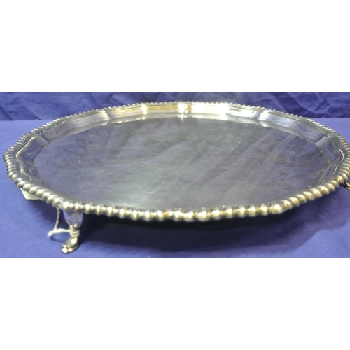 101 - George V Chester silver round serving tray with wavy gadroon raised rim, on 4 cast pad feet, 650g, 3... 