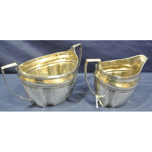 118 - George III London silver cream jug and sugar bowl of oval panelled form, with reeded rims and handle... 