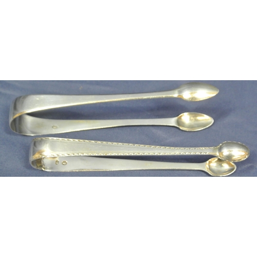 124 - 2 pairs of Georgian London silver sugar or ice cube tongs with oval grips, one bright cut, 54g