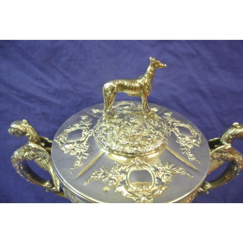 125 - Sheffield Victorian silver trophy cup of round tapering form decorated with winged lions, faces, scr... 