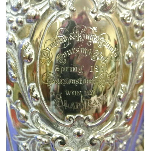 125 - Sheffield Victorian silver trophy cup of round tapering form decorated with winged lions, faces, scr... 