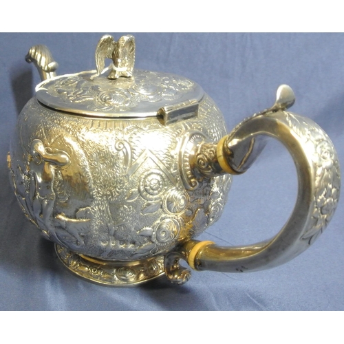 130 - George III London silver teapot of ball form, lid with eagle finial, scroll handle and shaped spout,... 