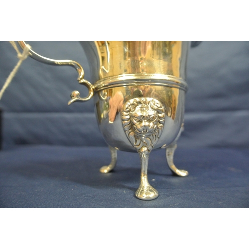 206 - Irish George III Silver cream jug with wavy rim, leaf capped scroll handle, central rim, on cast pad... 