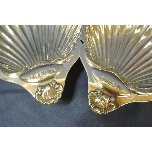 211 - Pair of Irish Provincial Silver shell shaped bon-bon dishes with scalloped rims, on 3 ball feet, by ... 