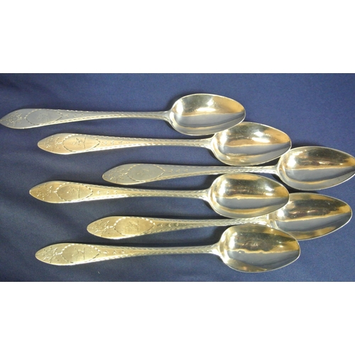 227 - Set of 6 Irish Provincial Silver dessert spoons with bright-cut crested handles, stamped 'STERLING',... 