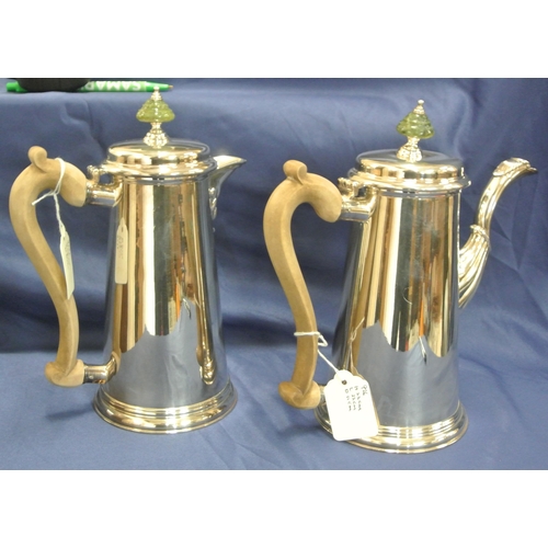 236 - Irish Silver teapot and hot water pot of round tapering form, lids with marble finials, shaped spout... 