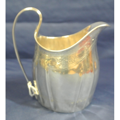 241 - Cork Silver George III cream jug with bright-cut foliate engraving and shaped handle, by John Nichol... 