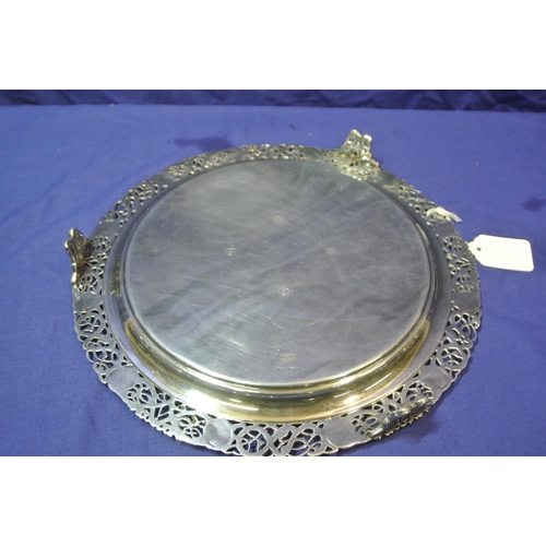 245 - Large Irish Silver round tray or server with ornate pierced and Celtic decorated raised border, on 3... 