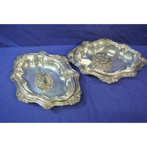 255 - Pair of heavy Irish Silver entree dishes, the covers with  detachable handles, shaped rims decorated... 