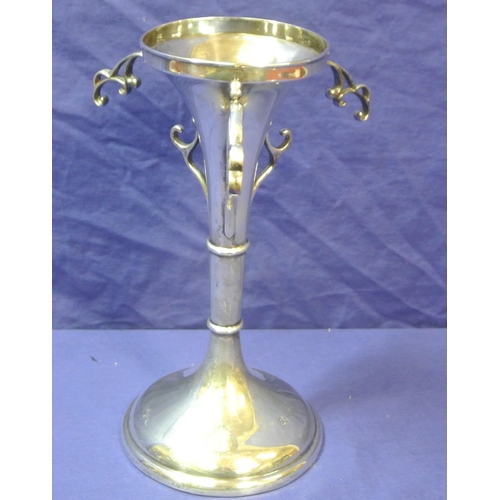 66 - George II Chester silver flower vase, flared with round rim, scroll handles, on round spreading base... 