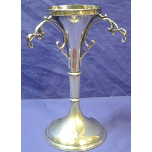 66 - George II Chester silver flower vase, flared with round rim, scroll handles, on round spreading base... 