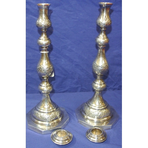 67 - Pair of George VI London silver candlesticks of double baluster and ball form, with foliate decorati... 