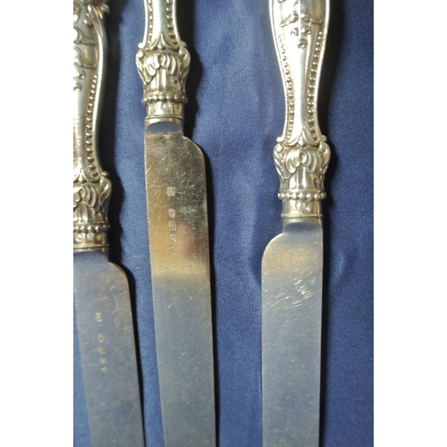 7 - Set of 12 silverplated knives and forks with foliate decorated handles