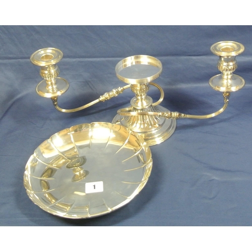 1 - Silverplated centrepiece with central round scalloped dish, shaped candle sconces, on spreading roun... 